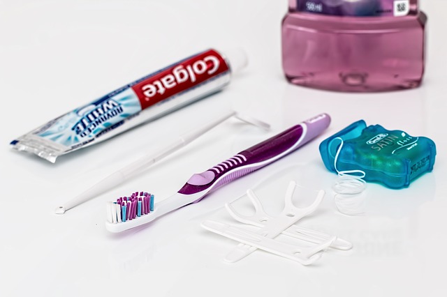 toothbrush, toothpaste, and floss