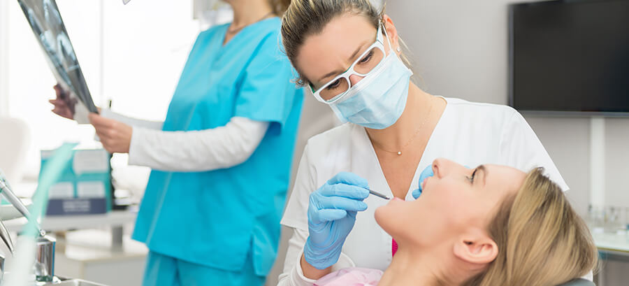 woman receiving a dental exam