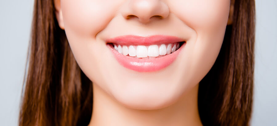 closeup of a woman's bright, white smile